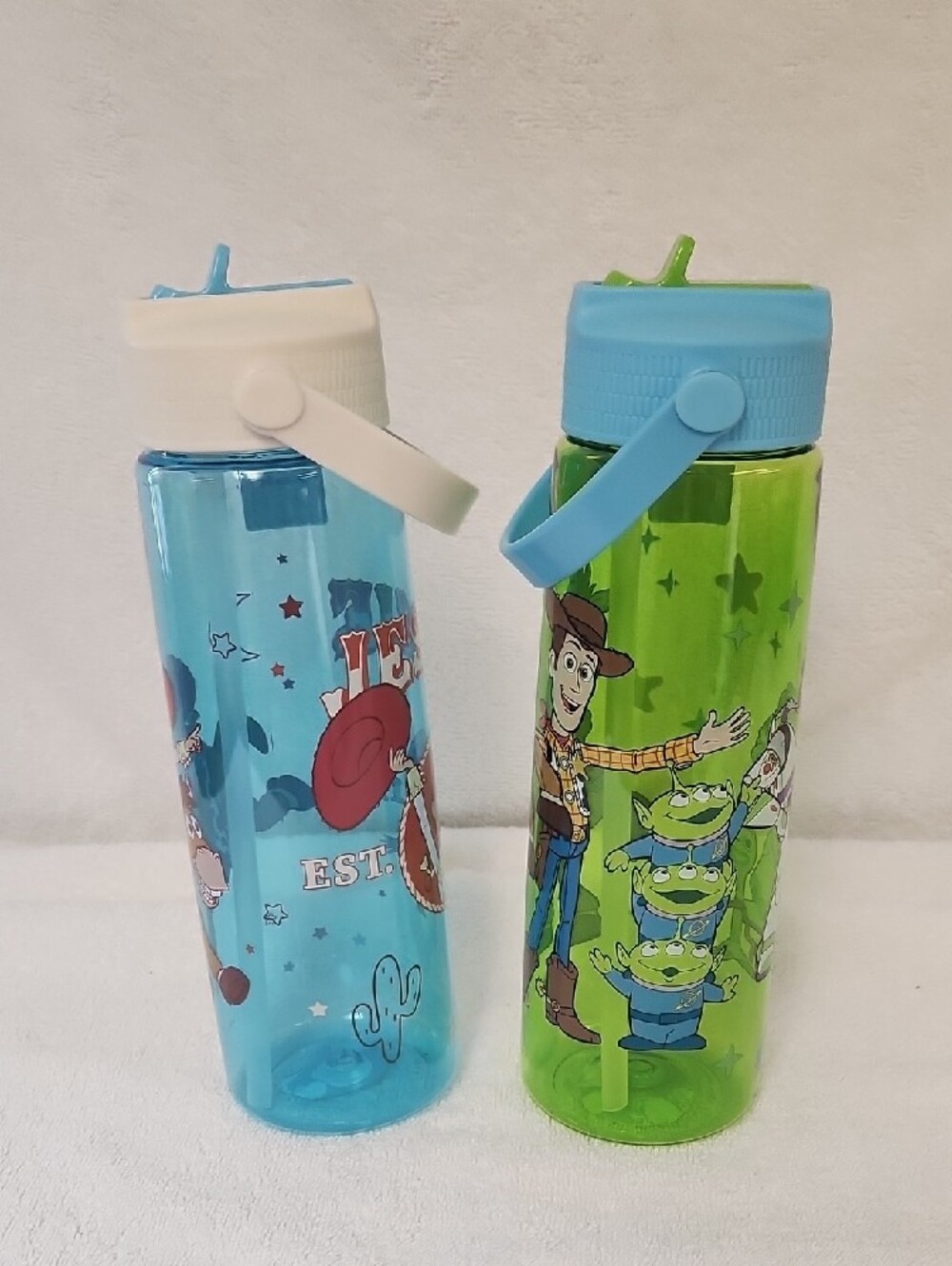 2 Kids' Toy Story Woody And Jessie Flip-Spout Water Bottles — Blue and Green - Picture 4 of 7